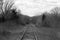 black white vintage photograph abandoned rural train tracks transportation railway countryside transport rails
