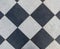 Black and white wintage checkered floor tiles