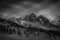 Black and white winter panorama of the majestic north face of Mount Pelmo