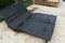 Black wicker sun bed isolate with clipping path. old sunbeds in the garden. Torn pool bed on the terrace. Destroyed chair pool by