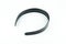 Black wide plastic headband on white background.  Headbands for hair