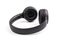 Black wireless headphones on white background.  Advanced acoustic stereo sound system