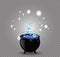 Black witch cauldron with blue sparkling boiling potion and bubbles isolated.