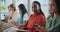 Black woman, book and writing with row for hiring, job or career opportunity in waiting room at office. Portrait of