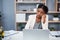 Black woman, desk and sleep with laptop, paperwork and burnout in financial administration. Fatigue, audit and