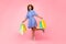 Black Woman Doing Shopping Posing With Shopper Bags, Pink Background