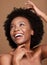Black woman, facial skincare and hair glow with a happy smile, natural haircare health product and organic skin wellness