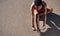 Black woman, fitness and shoes in preparation for running, exercise or cardio workout on mockup. African American woman