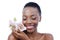 Black woman, flower and smile for natural beauty, dermatology and skincare for glow and wellness on white background