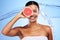 Black woman, grapefruit or smile with water splash for health skincare, wellness or nutrition against a blue studio