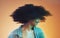 Black woman with hair blur, disco and dance with glitter fashion, movement with afro against studio background. Natural