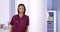 Black woman nurse standing in office