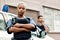 Black woman, police and arms crossed in city for law enforcement protection or street safety. Portrait of serious