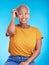 Black woman, scratch head and confused in studio with thinking, mindset or ideas for decision by blue background