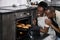 Black woman shows off what she cooked in the oven