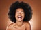 Black woman, skincare beauty and hair care model with healthy afro, natural cosmetics empowerment and happy laugh