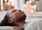 Black woman sleep, peace and luxury spa face treatment of young female ready for facial. Skincare, beauty and wellness