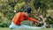 Black woman stretching leg in the park for fitness, health and wellness before a run. Exercise, sports and female