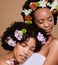 Black women, flowers and skincare of beauty, wellness and skin glow of friends support and treatment. Calm black woman