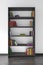 Black wooden bookcase with many different books