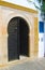 Black wooden door of an Arabian house with a pattern