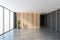 Black and wooden empty reception hall, grey floor near windows