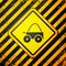 Black Wooden four-wheel cart with hay icon isolated on yellow background. Warning sign. Vector