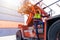 Black worker African working engineer foreman in port cargo shipping customs container yard