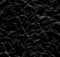 Black wrinkled paper background texture