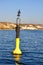 Black and yellow channel marker