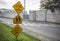 Black and yellow children crossing ahead sign