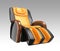 Black and yellow leather reclining massage chair.