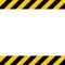 Black and yellow line striped background. Caution tape