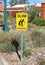 Black and yellow Slow Pedestrians sign at an aged care facility