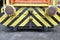 Black and yellow striped diesel locomotive front view