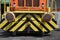 Black and yellow striped diesel locomotive front view