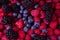 Blackberries, blueberries and raspberries, table top view