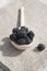 Blackberries in a wooden spoon. Vertical orientation. Close up