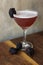 Blackberry cocktail with a wooden background