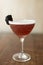 Blackberry cocktail with a wooden background