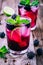 Blackberry mojito cocktail with lime, and mint