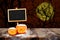 Blackboard with easel on grunge plank wooden and pumpkin with sm