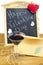Blackboard with hearts and and a wine glass