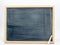 Blackboard isolated on a white background with a white chalk in the corner