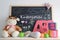 Blackboard in a kindergarten classroom and some baby stuff.