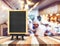 Blackboard menu with easel on wooden table with blur open kitchen at restaurant background, Copy space for adding your content