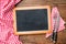 Blackboard with a red checkered tablecloth