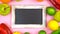 Blackboard surrounded by healthy food,