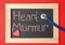 Blackboard with text HEART MURMUR and stethoscope