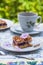 Blackcurrant coconut slice with tea